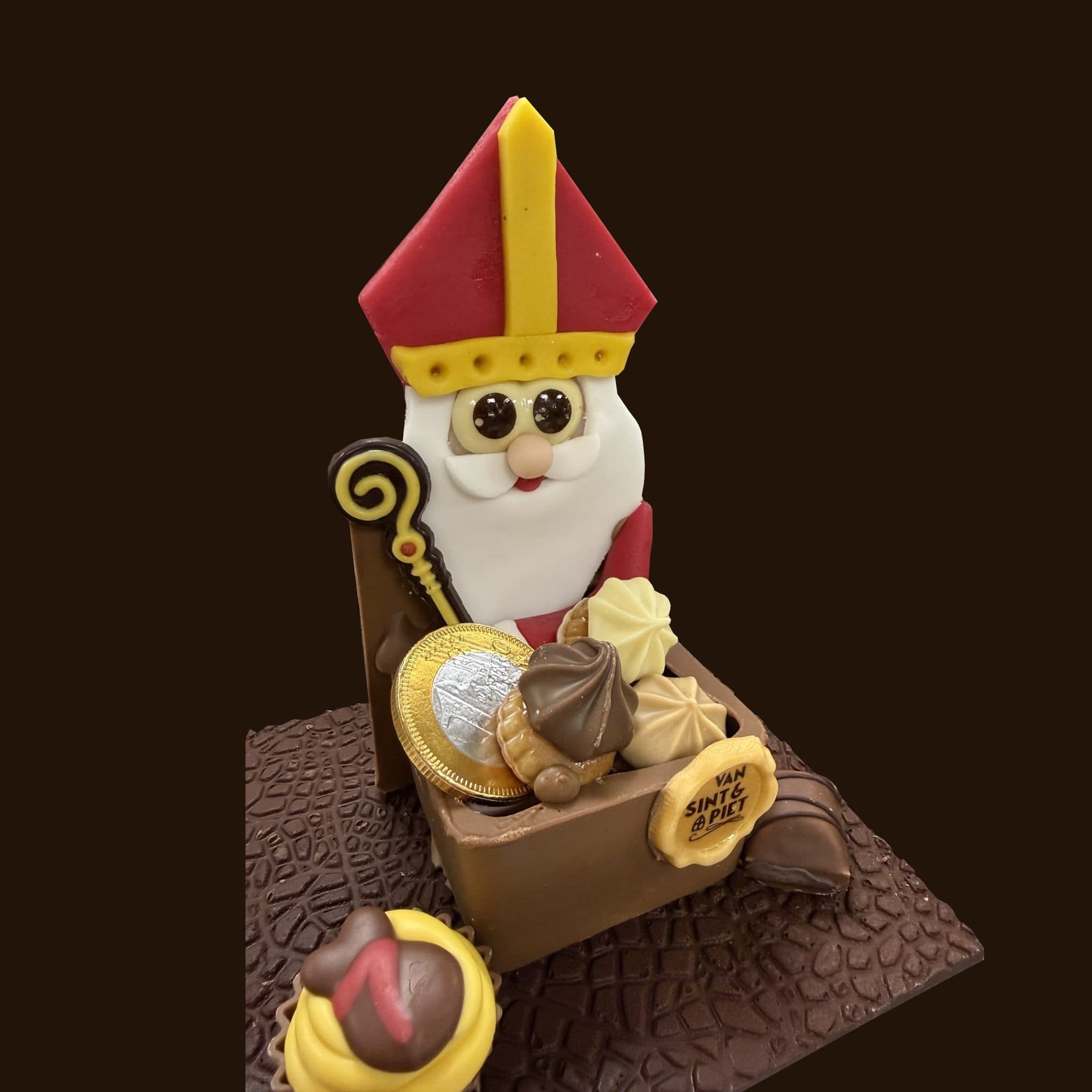 Sinterklaas met een bakje snoep