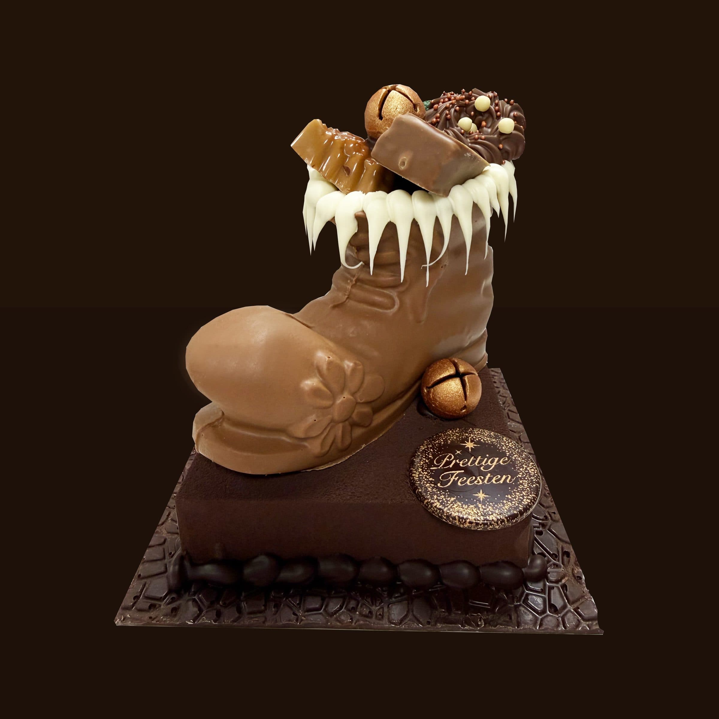 Schoen van melkchocolade met pralines